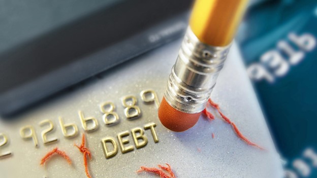a pencil is erasing credit card debt