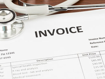 Medical invoice with a stethoscope | Texas bankruptcy lawyers