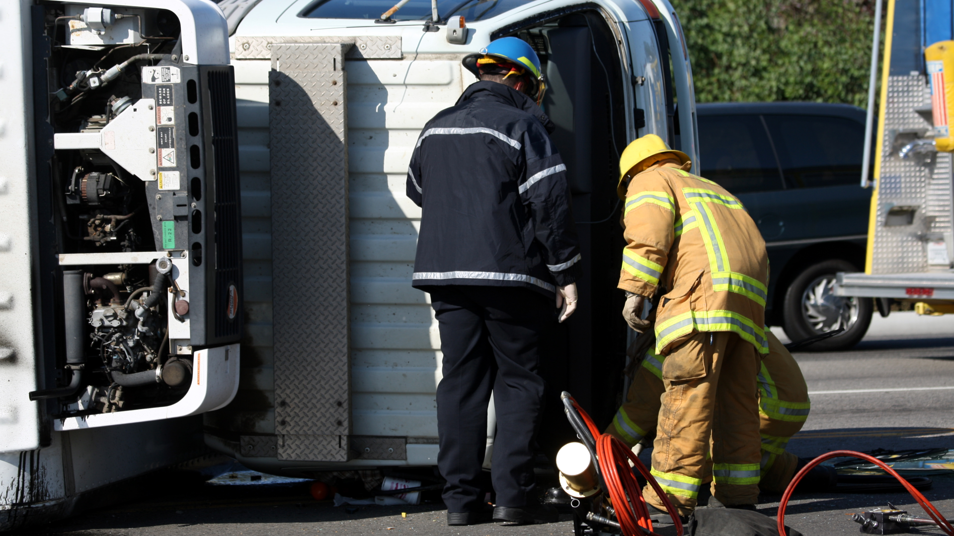 Firefighters at the scene of a truck accident