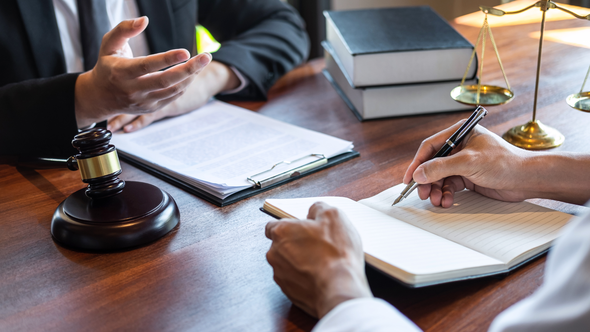 Lawyers discussing paperwork