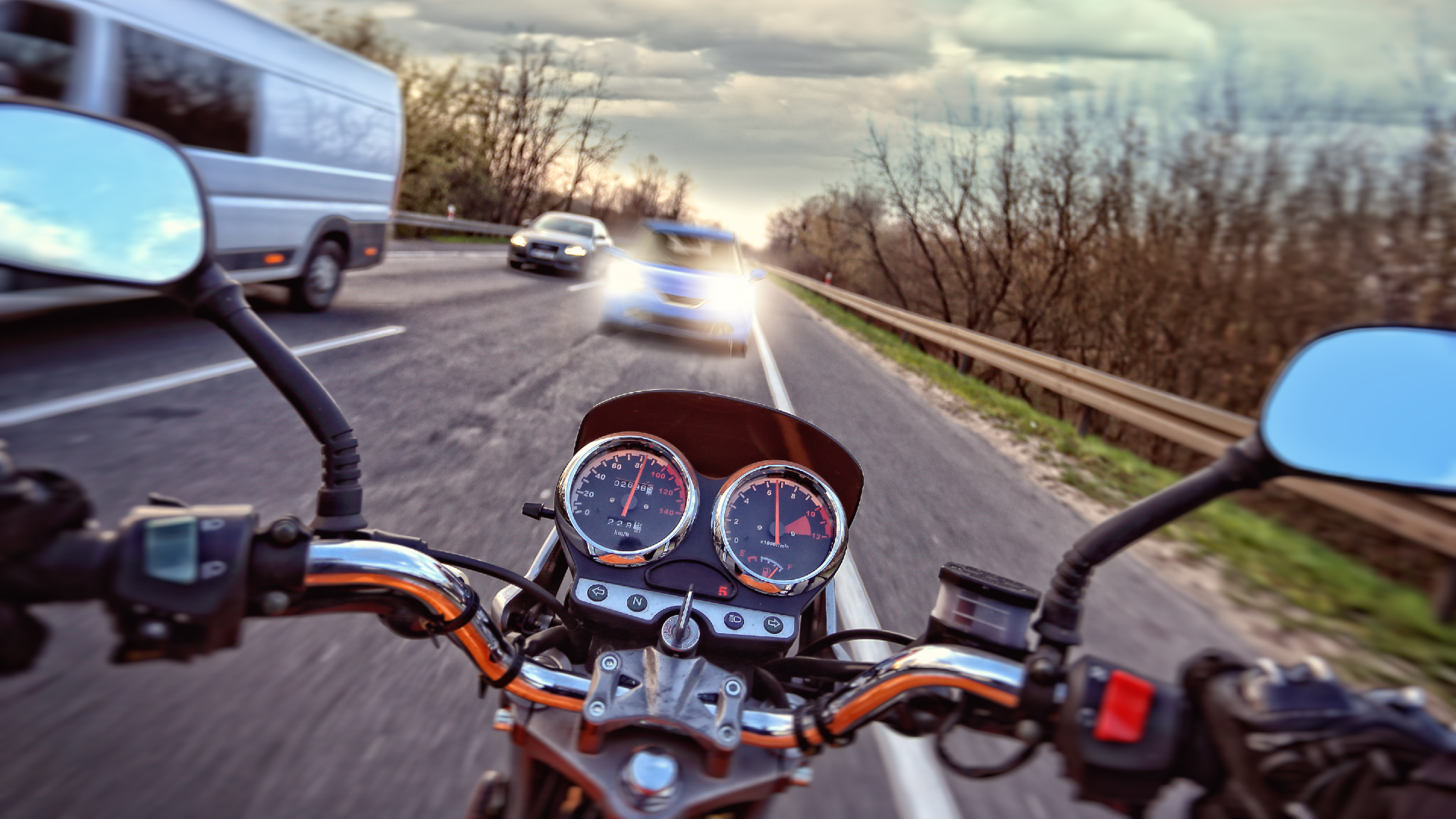 The POV of a motorcyclist as they are about to collide with car in motorcycle accident