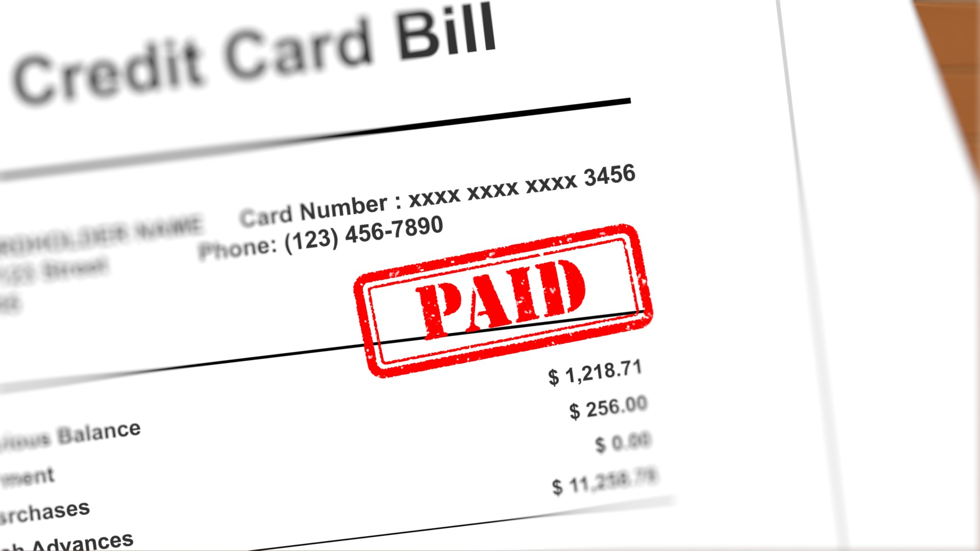 A credit card bill with the word “paid stamped over it shows how our Texas bankruptcy lawyers can help