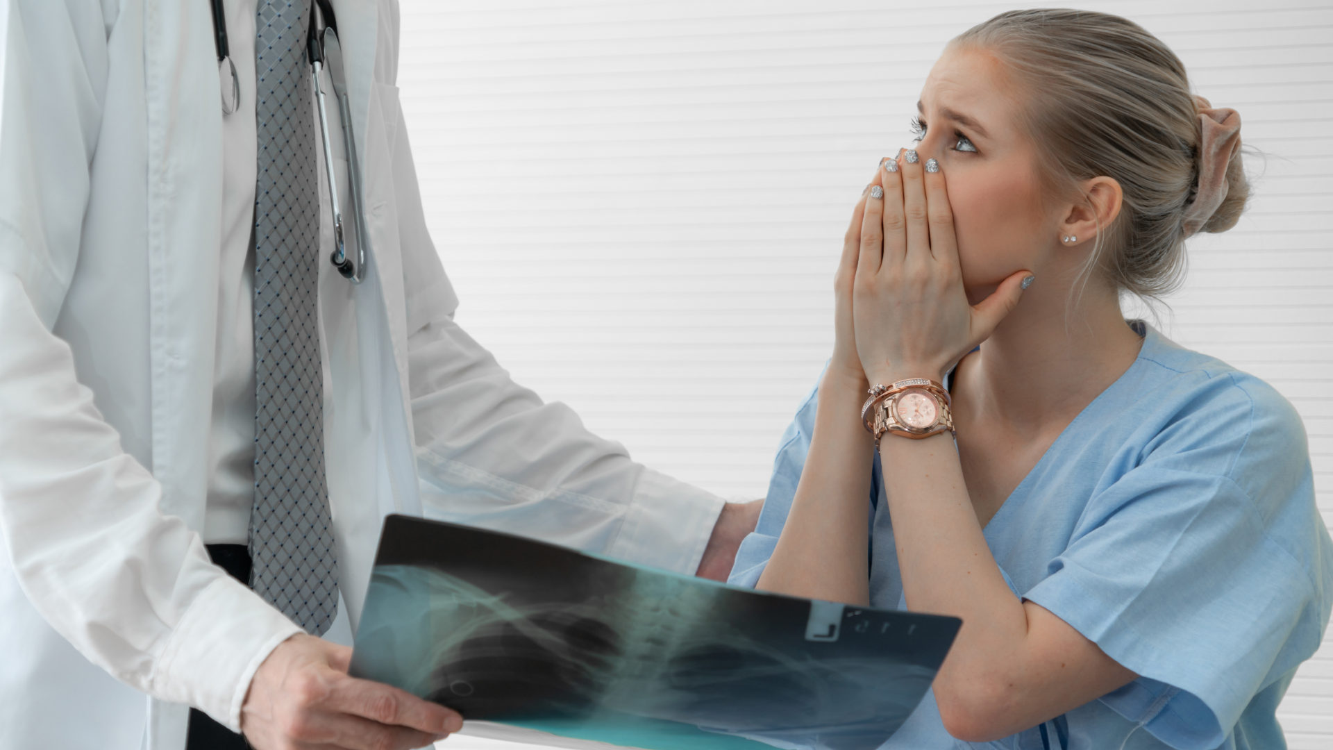 A patient is shocked as their doctor presents their x-ray results