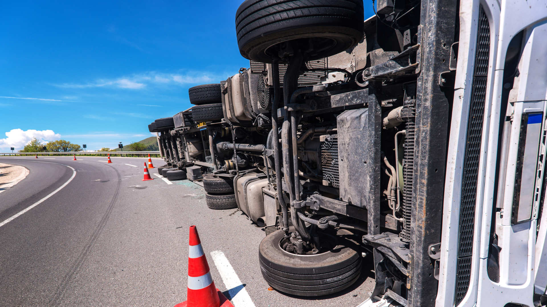 A truck tipped over in a highway truck accident