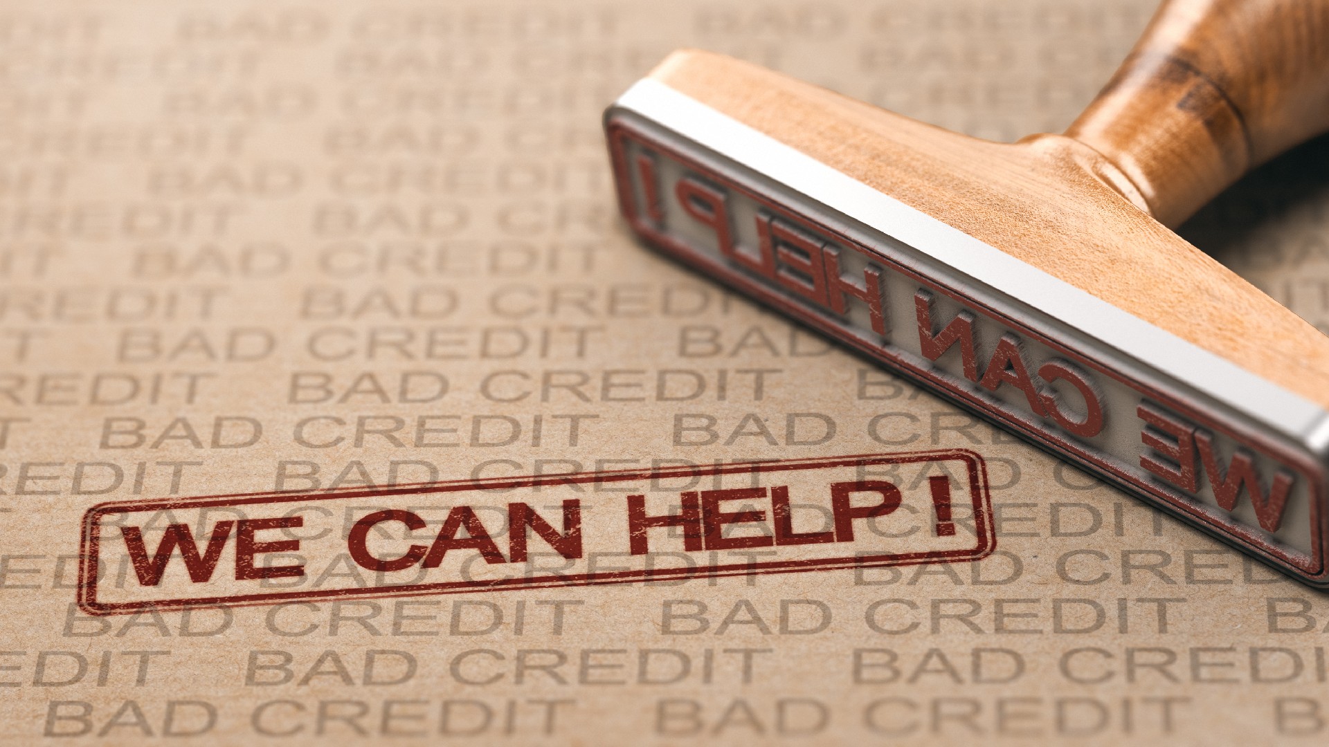 A background with an allover “bad credit” print features a stamp saying “we can help”