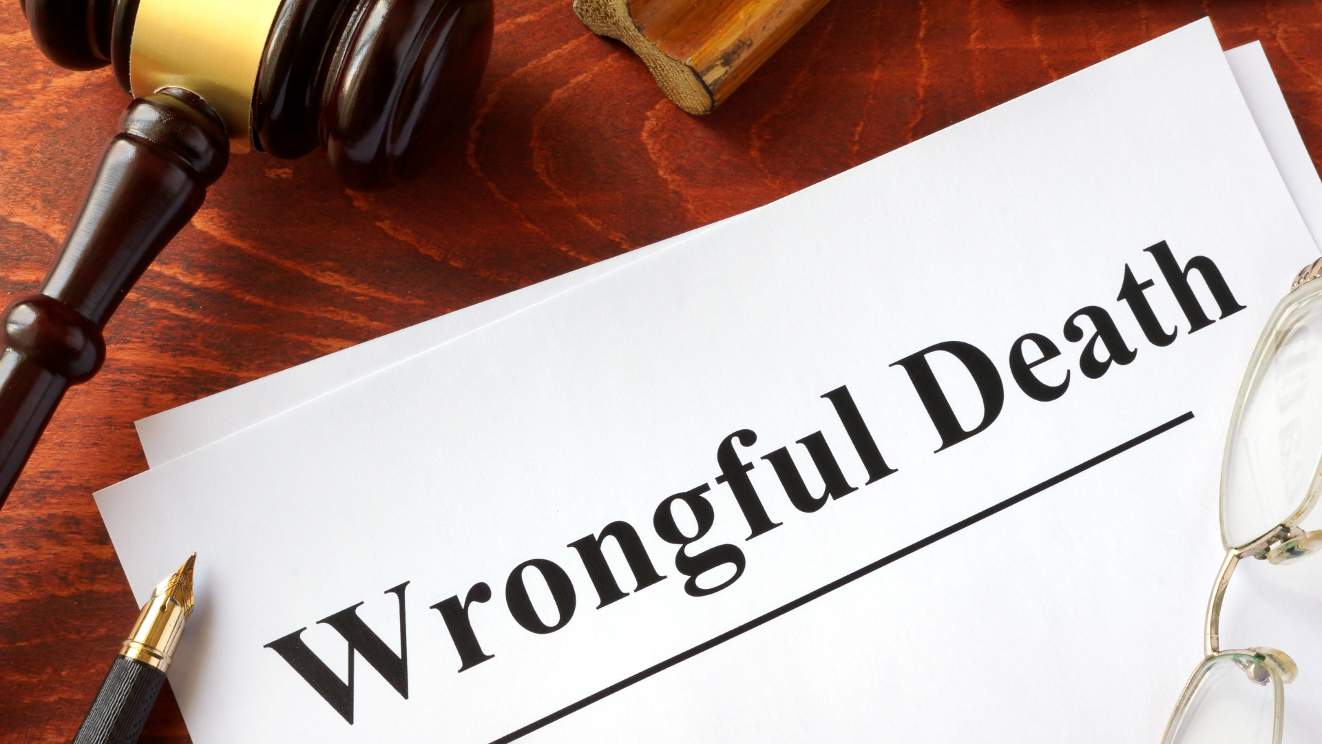 Wrongful death paperwork with a gavel on top