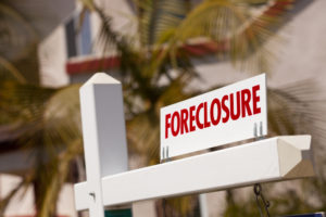 Foreclosure sign outside of house